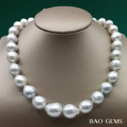 New 15*10 29 pcs. Baroque pearl necklace overall length including hook 17 inches.